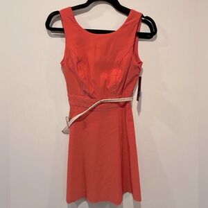 Bcx size 3 coral dress with off white belt. Zips up in back